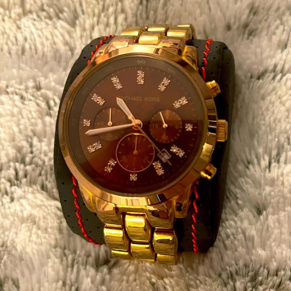 Michael Kors mens watch with diamond hour marks gold band